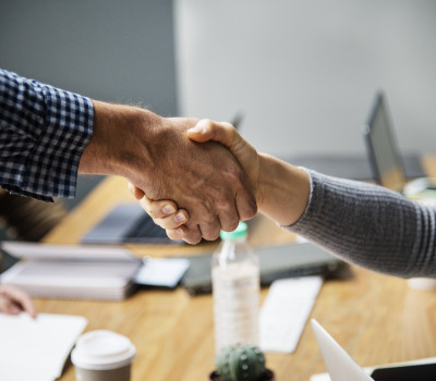 business people shaking hands agreement